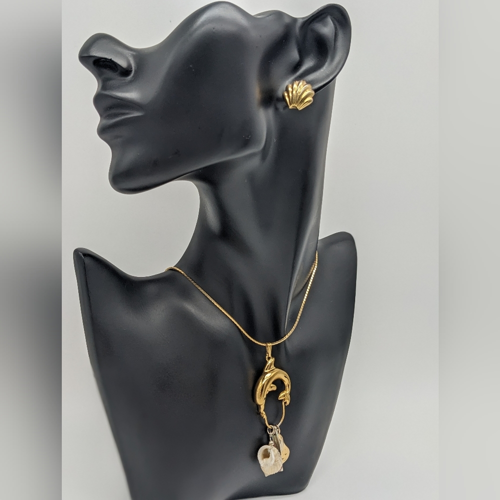 Sea team Napier necklace and seashell Monet earrings.